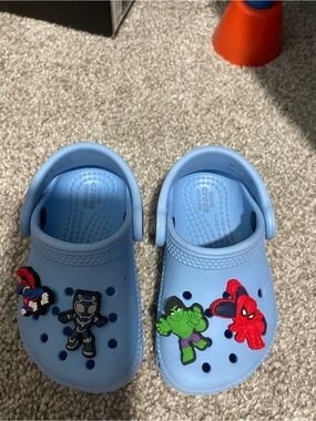 CROCS Kids Light Blue Clogs with Superhero Jibbitz
